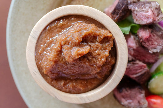 Fire Roasted Blackened Salsa in a bowl on a plate
